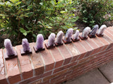 5-7" tall. Pure Grade A Amethyst Cluster on wooden stand from Brazil. 