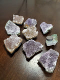1 3-4 inch Clear Quartz or Amethyst Cluster mounted on magnet.