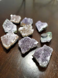 1 3-4 inch Clear Quartz or Amethyst Cluster mounted on magnet.