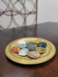 You will receive an intuitively picked flat, round, polished stone about 2" diameter in one or more of the following stones: rose quartz, jasper, bloodstone, or agate. 