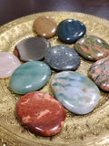 You will receive an intuitively picked flat, round, polished stone about 2" diameter in one or more of the following stones: rose quartz, jasper, bloodstone, or agate. 
