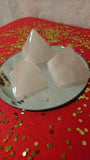 2-3 inch rose quartz pyramids from Brazil.