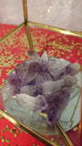 grade AA purple amethyst points from Brazil have a deep purple hue