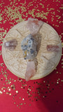 Includes:  4 Hematoid "Fire" Quartz,   4 Clear Quartz Mini Points,  1 Galena on Quartz, 1 6-inch Wooden Engraved Crystal Grid Base