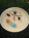 1 black tourmaline, 1 blue apatite, 1 Lapis Lazuli, 1 honey calcite, 1 amethyst point