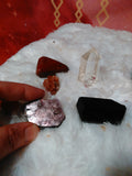 Includes: 1 Quartz Point, 1 Aragonite Cluster, 1 Red Jasper, 1 Black Tourmaline, 1 Lepidolite Slice